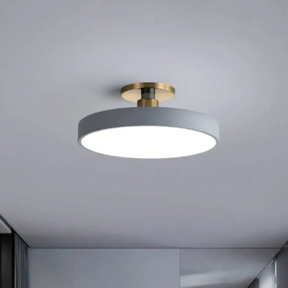 DecorBites™ nordic style round flush mount light with matte gray shade and polished brass mounting hardware
