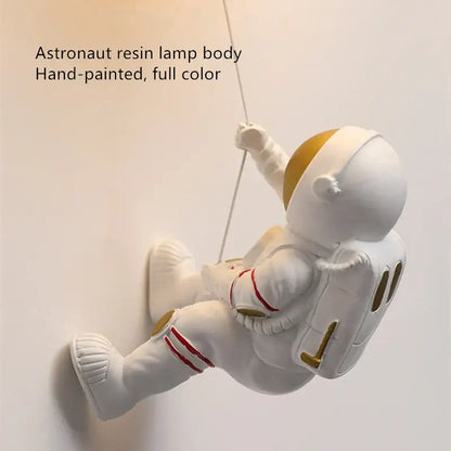 Modern white and gold hand-painted resin wall lamp with red accents decorbites astronaut moon for bedroom lighting