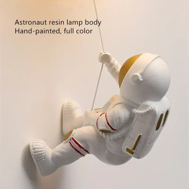 Modern white and gold hand-painted resin wall lamp with red accents decorbites astronaut moon for bedroom lighting