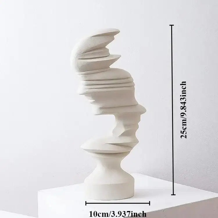 A sleek off-white ceramic modern blue decorbites abstract human face sculpture with layered spiraling forms for living room decor
