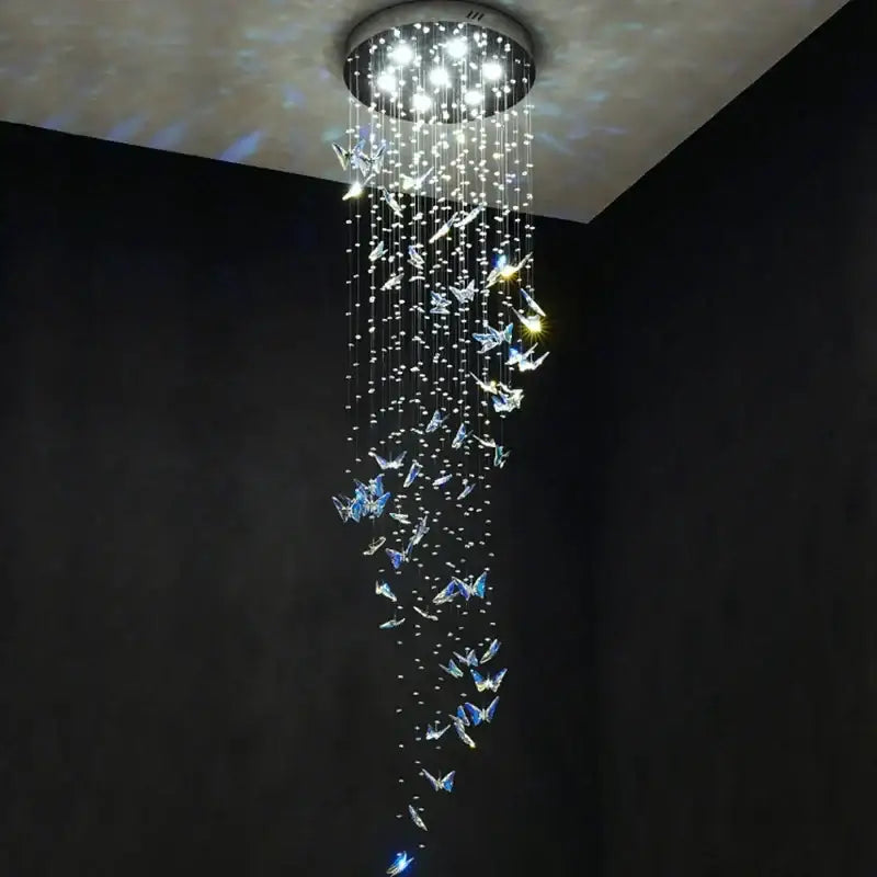 Modern blue and clear crystal staircase chandelier by decorbites with butterfly ornaments and bright led lights for living room decor