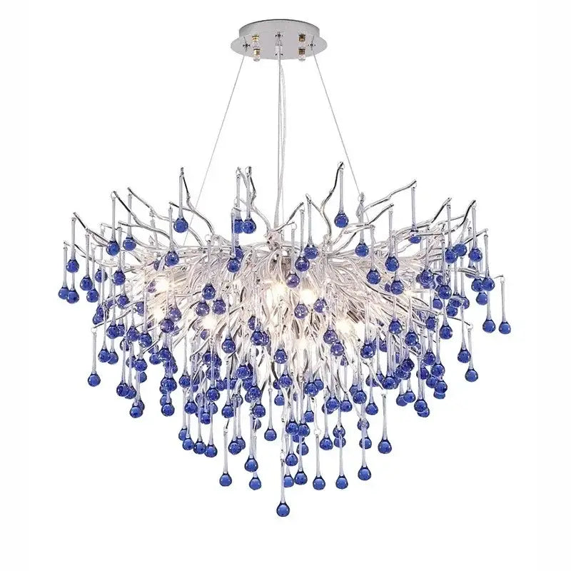 A modern blue crystal led pendant light with chrome mount and clear glass branches featuring decorbites blue crystal drops