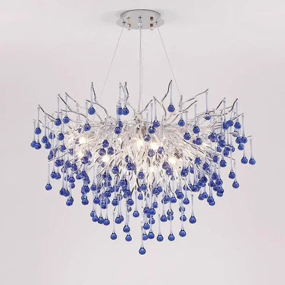 Modern blue crystal led pendant light with a chrome metal frame and dangling blue glass teardrop decorbites blue crystal