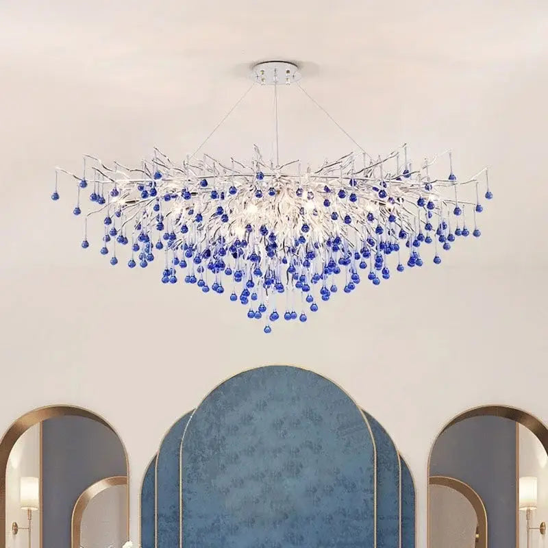Modern blue crystal led pendant light with silver metallic frame and dangling blue glass beads for living room decorbites blue crystal