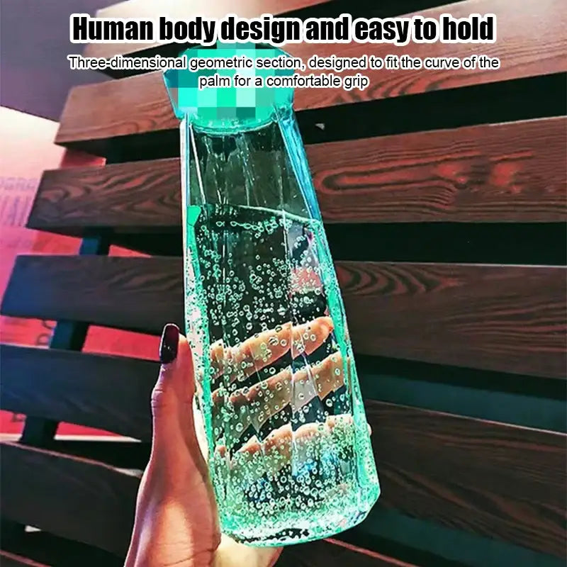 Modern blue diamond water bottle with transparent turquoise geometric human body design and bubble-infused diamond water