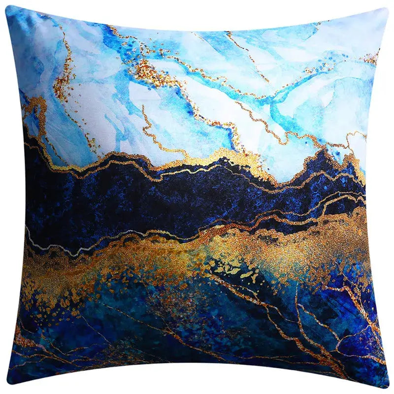 Modern blue floral cushion cover featuring a blue and gold marble-patterned design for stylish living room decorbites decor