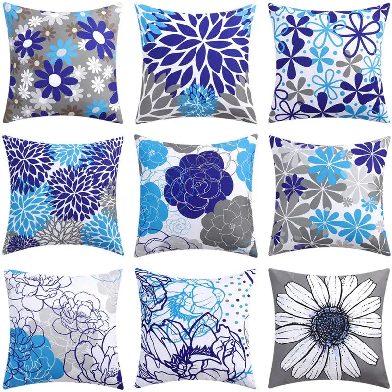 Set of nine modern blue floral cushion covers with abstract botanical designs in blue gray white and black for living room decorbites