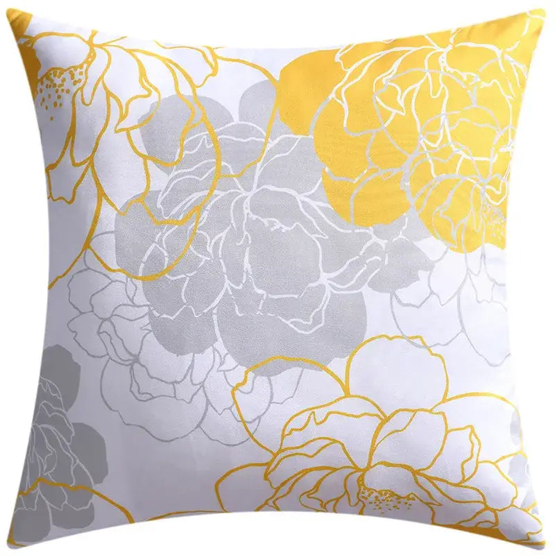 A modern blue floral cushion cover featuring bold yellow and soft gray tones for stylish living room decorbites decor