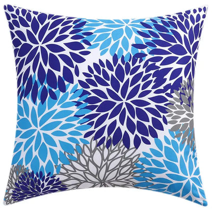 Square throw pillow with vibrant deep and medium blue floral pattern on white cushion cover for modern living room decorbites blue floral