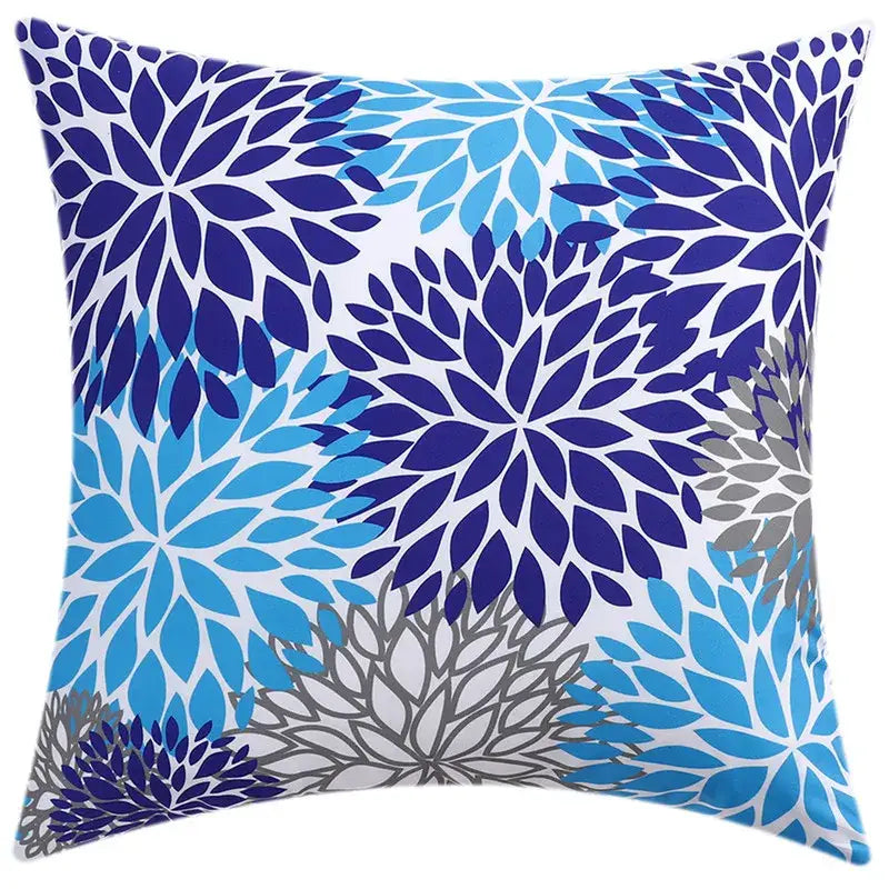Square throw pillow with vibrant deep and medium blue floral pattern on white cushion cover for modern living room decorbites blue floral