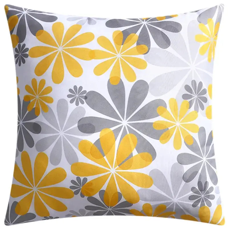 Modern blue floral cushion cover with vibrant yellow and gray stylized flowers on white for living room decorbites decor