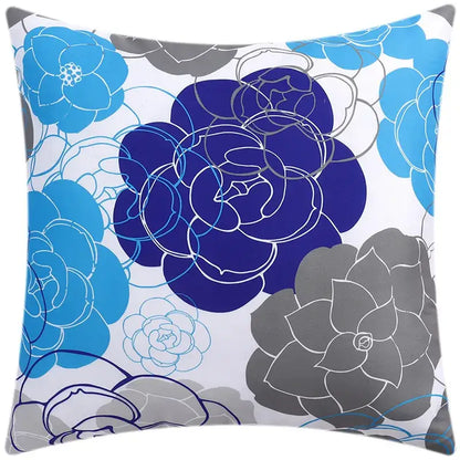 Square cushion cover with bold blue floral pattern in navy and gray on white for modern living room decorbites decor