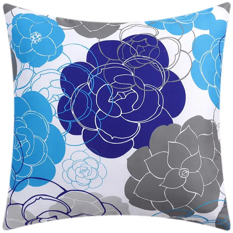 Square cushion cover with bold blue floral pattern in navy and gray on white for modern living room decorbites decor