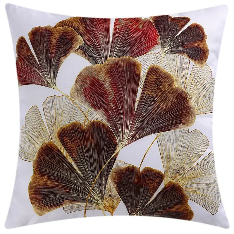 White throw pillow with elegant ginkgo leaf pattern in brown red and gold for modern blue floral cushion cover decorbites decor