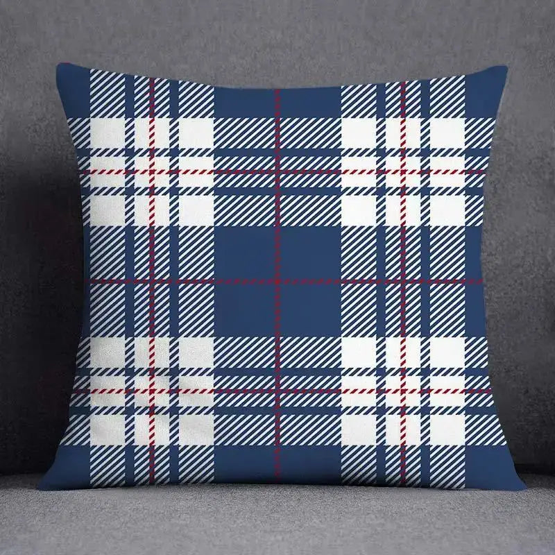 Modern blue geometric floral design throw pillow with blue white and red plaid diagonal stripes for living room use