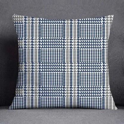 Modern blue geometric floral design square cushion with navy blue white and gray houndstooth pattern for living room