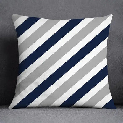 Square throw pillow with navy blue white and light gray diagonal stripes featuring a modern geometric floral design