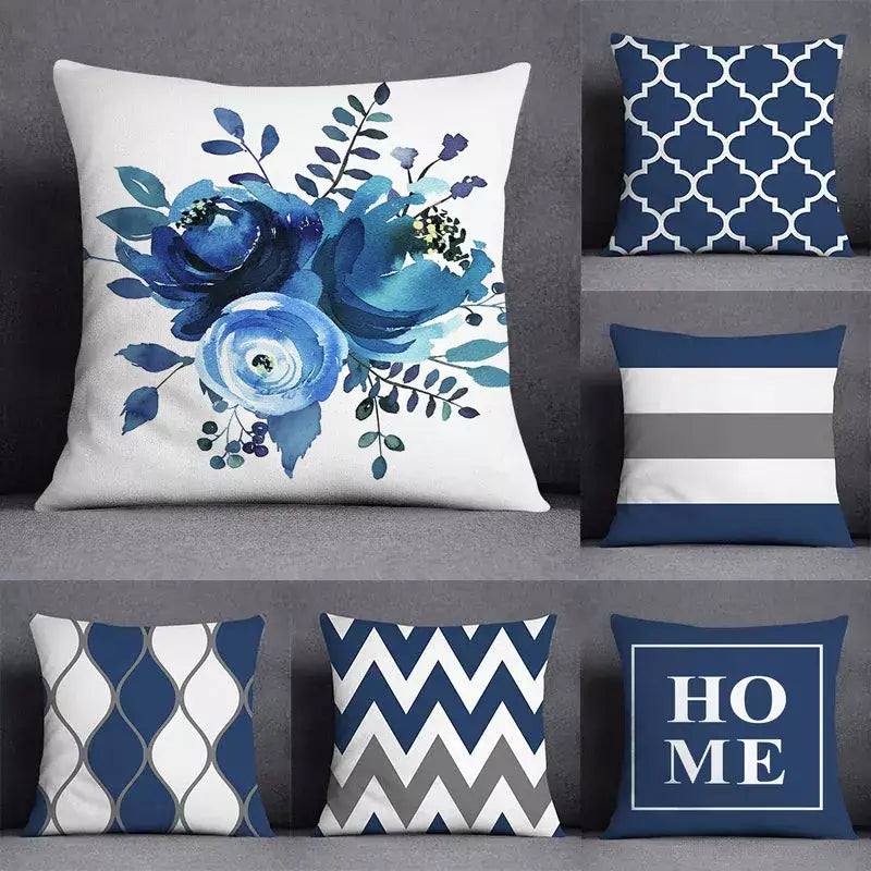 Modern blue geometric floral design pillowcase featuring watercolor floral design with green leaves on white background