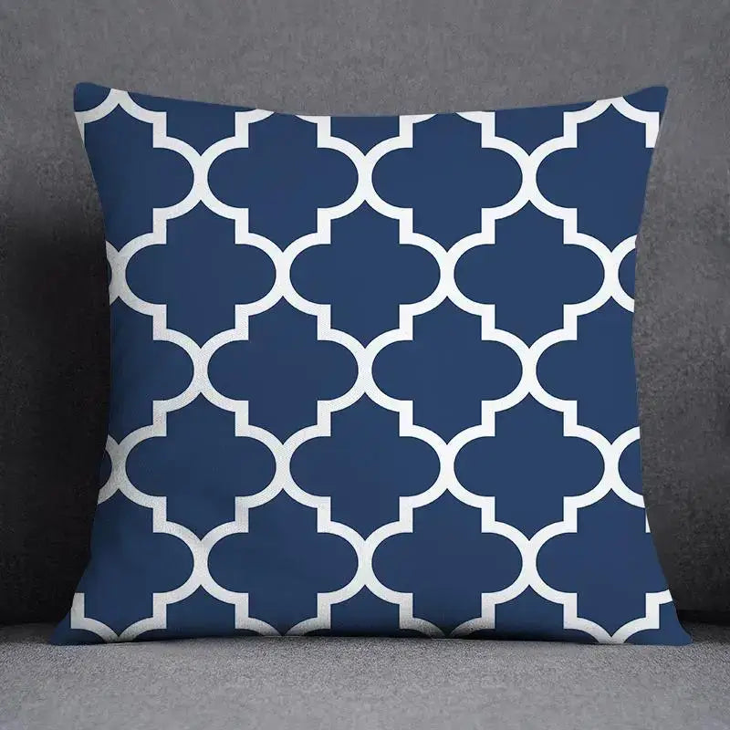 Navy blue throw pillow with white geometric floral design pattern for modern living room cushion decor