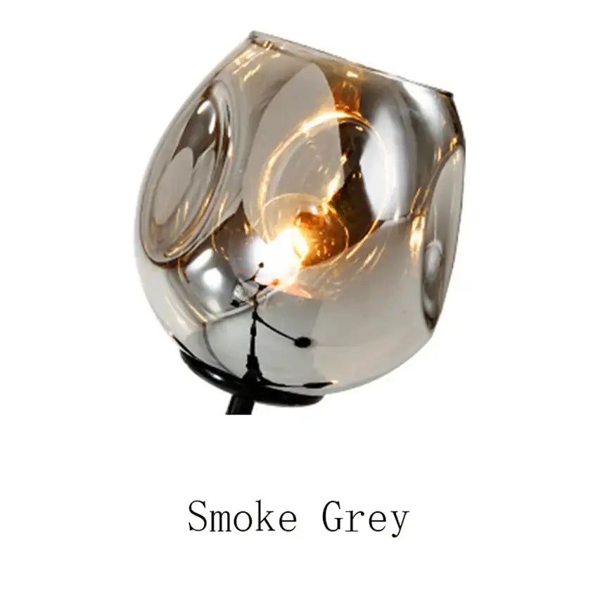 Modern blue glass black gold pendant light with smoke grey glass black gold lampshade and rounded design