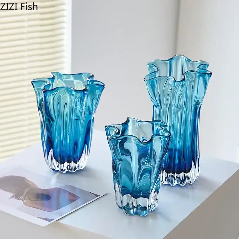 Three translucent blue glass hydroponic vases with ruffled rims and vertical ridges for modern decorbites blue glass desk decor