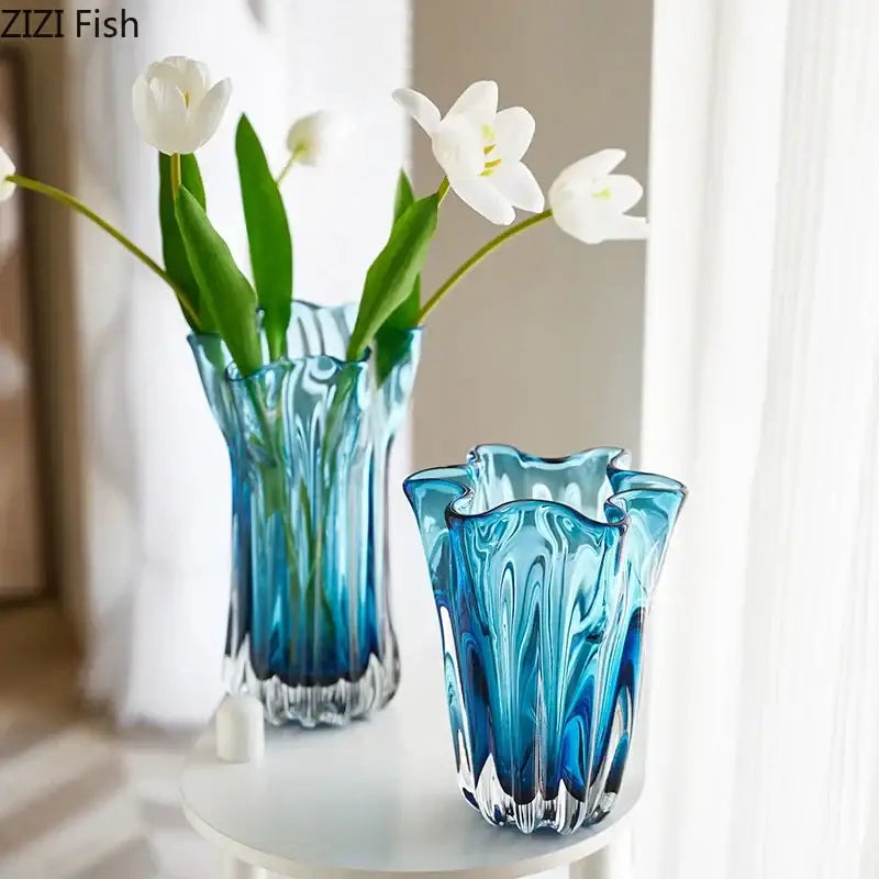 Two translucent blue glass hydroponic vases with wavy rims and textured ridges for modern office decorbites blue glass decor