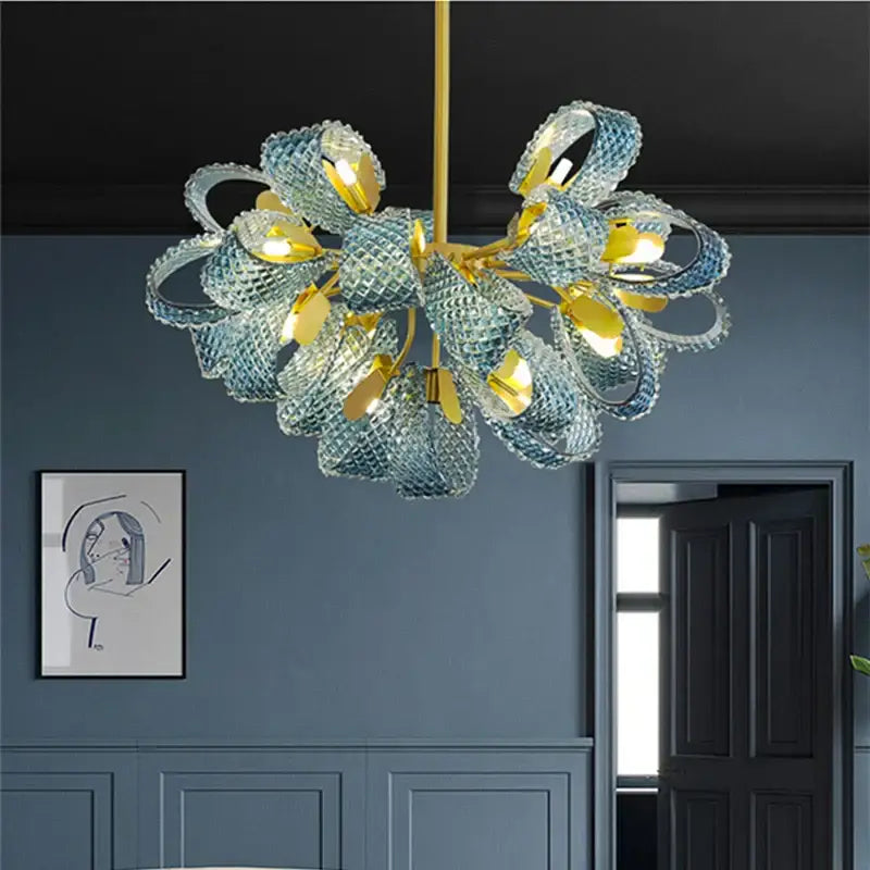Modern blue glass led pendant lamps featuring a delicate light blue glass chandelier with gold-toned decorbites blue glass frame