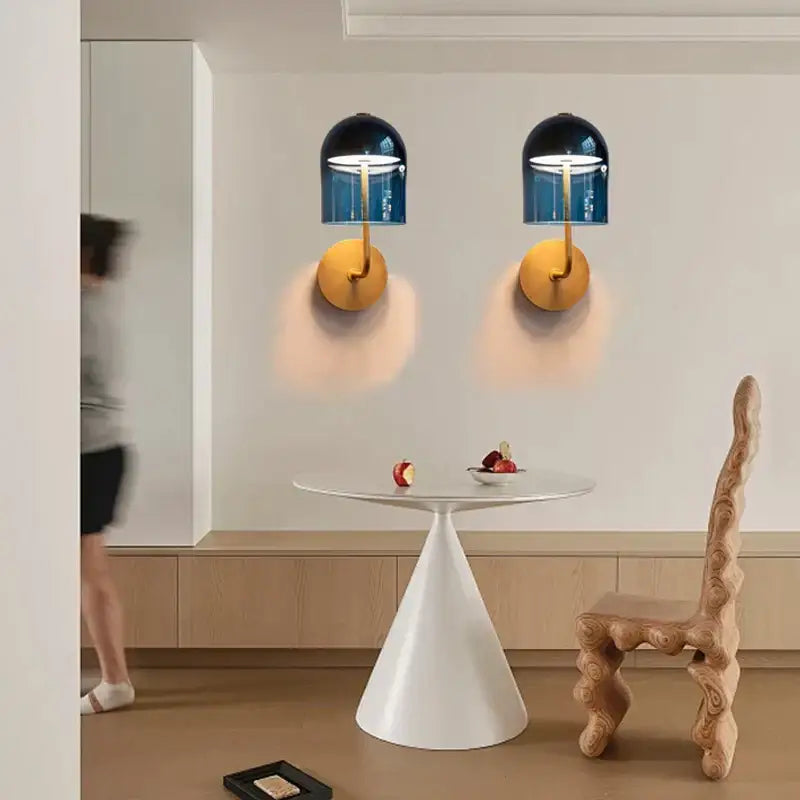 Modern blue glass wall lamp pair with gold-toned metal bases decorbites blue glass bedroom sconces
