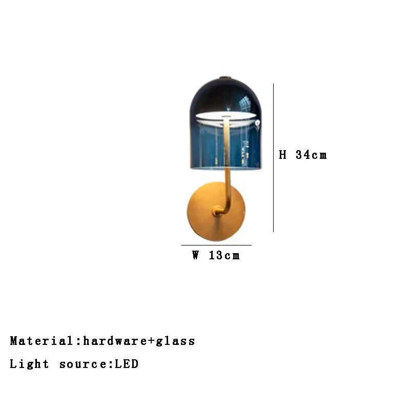 Modern blue glass wall lamp with a gold-toned brass base and translucent blue glass dome for bedroom decorbites wall lamp pair
