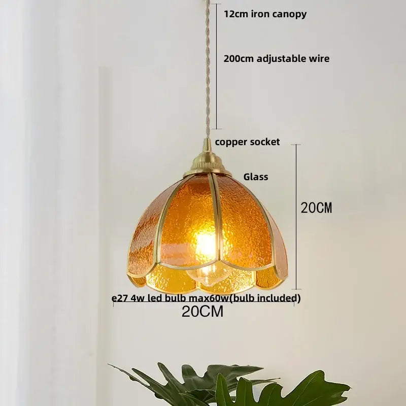 Modern blue and gold decorbites butterfly glass led pendant light featuring a warm amber floral glass with copper socket