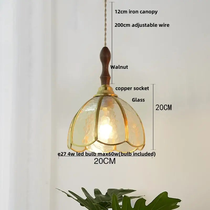 A warm-toned glass pendant light with walnut iron canopy and copper socket featuring decorbites butterfly glass led design
