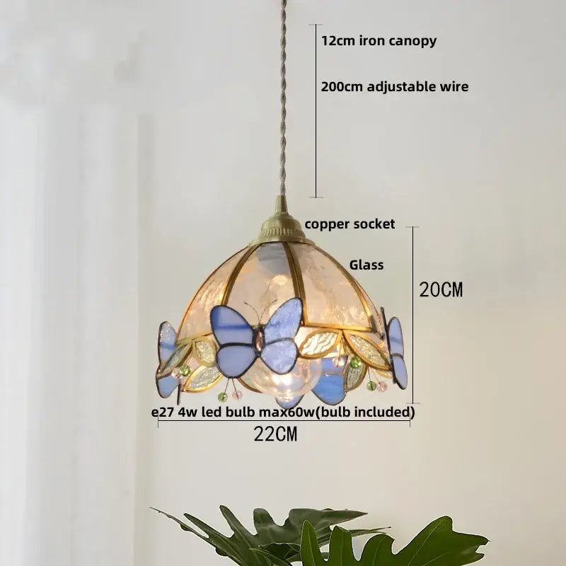 Delicate tiffany-style pendant light with decorbites butterfly glass in blue and gold tones with brass copper socket