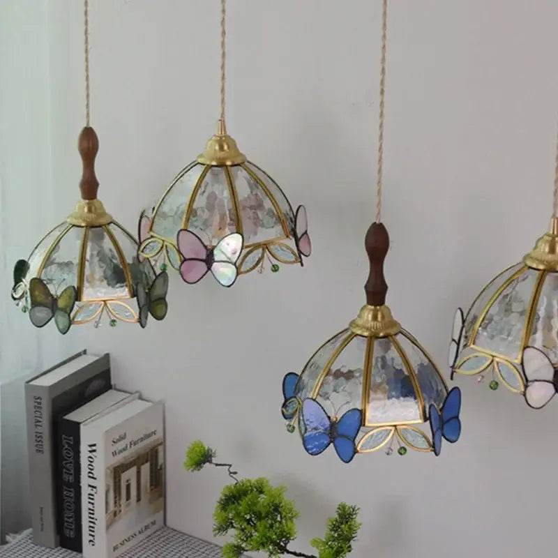Modern blue and gold butterfly glass led pendant light with gold metal frames and wooden finials for kitchen decorbites butterfly glass decor