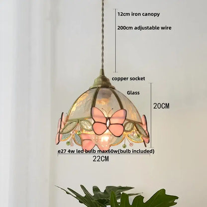 Modern blue and gold butterfly glass led pendant light featuring a delicate pink butterfly stained glass with copper socket and iron canopy decorbites butterfly glass