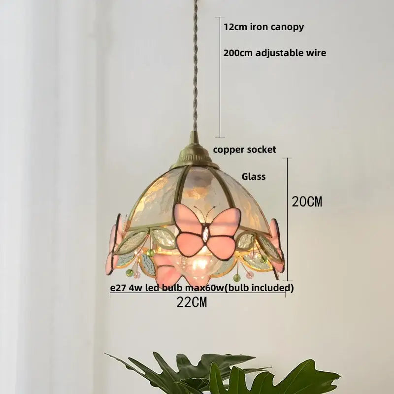 Modern blue and gold butterfly glass led pendant light featuring a delicate pink butterfly stained glass with copper socket and iron canopy decorbites butterfly glass