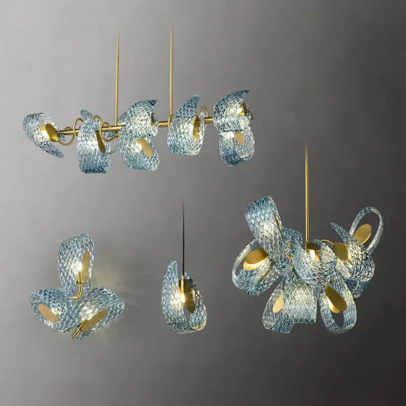 Elegant decorbites glass chandelier with blue glass and gold-toned metal accents for modern dining room lighting
