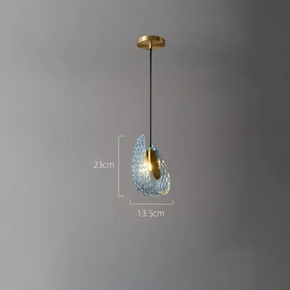 A delicate blue decorbites glass chandelier with gold ceiling mount and black cord for dining room lighting