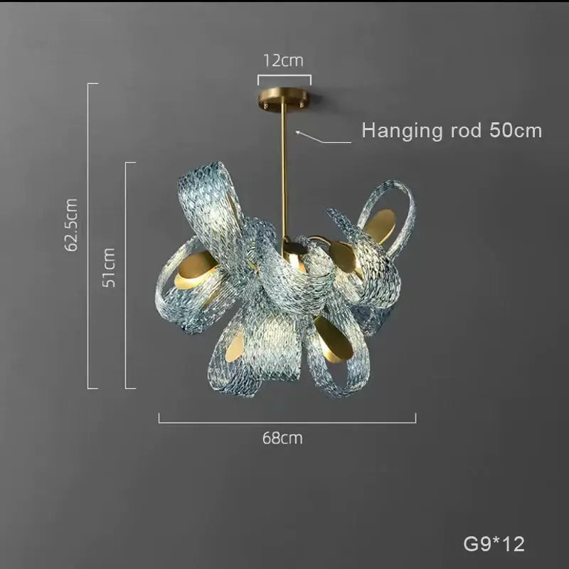 A modern blue and green decorbites glass chandelier with frosted glass and gold metal for dining room lighting