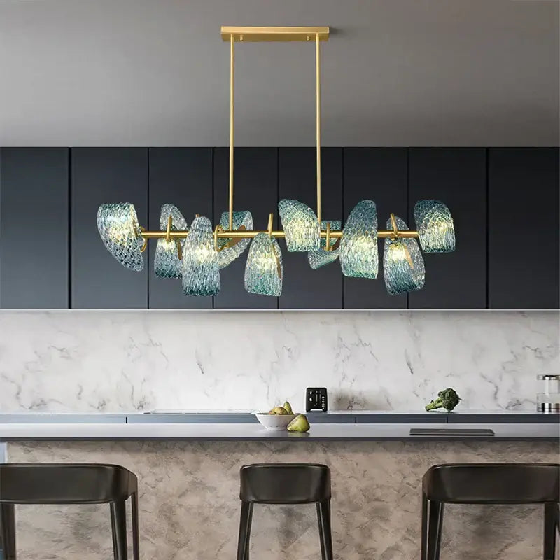 Modern blue and green decorbites glass chandelier with gold-toned frame and textured glass shades for dining room light