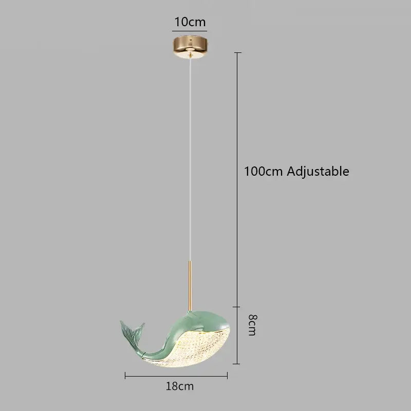 A sleek mint-green and cream ceramic whale-shaped decorbites dolphin chandelier with gold-tone ceiling mount