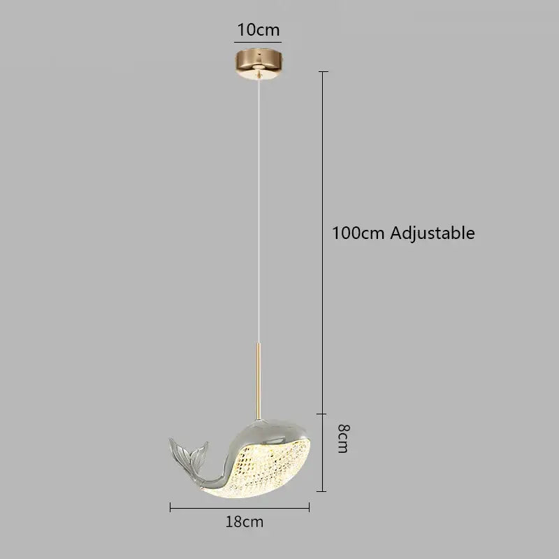 A sleek metallic silver whale-shaped pendant light with a lace-patterned glass belly for decorbites dolphin chandelier