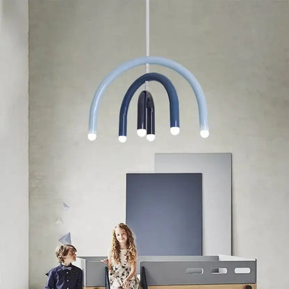 Modern blue and navy arched pendant light with layered curved arms and glowing bulbs for dining room design