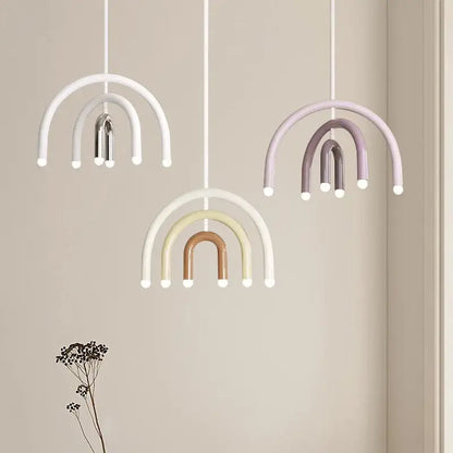 Modern blue and navy pendant light with pastel minimalist rainbow design and matte finish for dining room use