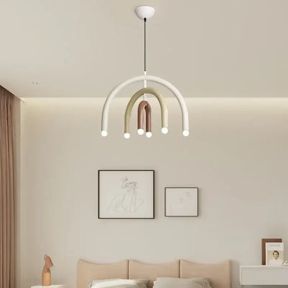 Modern pendant light with arched arms in white sage green and rose gold for dining room design in square meters