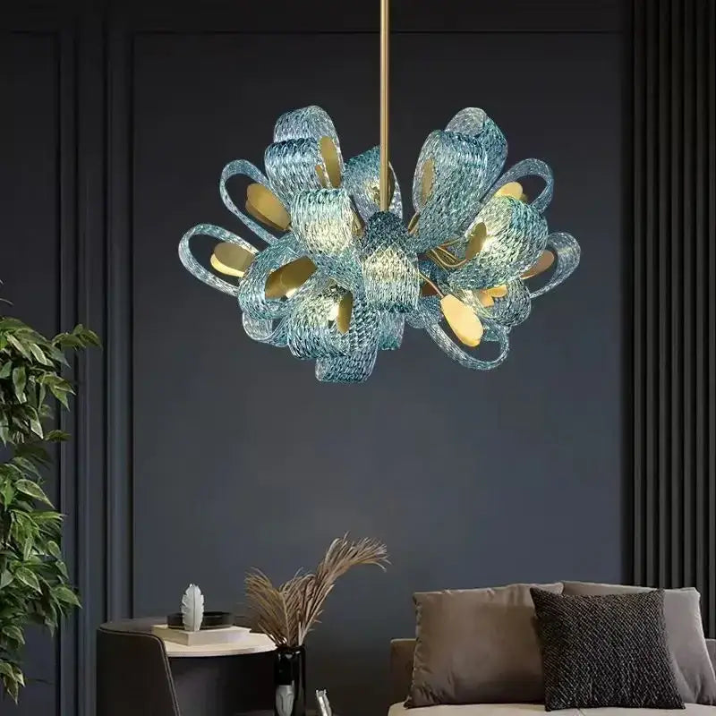 Modern blue peacock leaf glass chandelier with delicate translucent blue glass and gold accents for dining room decorbites blue peacock