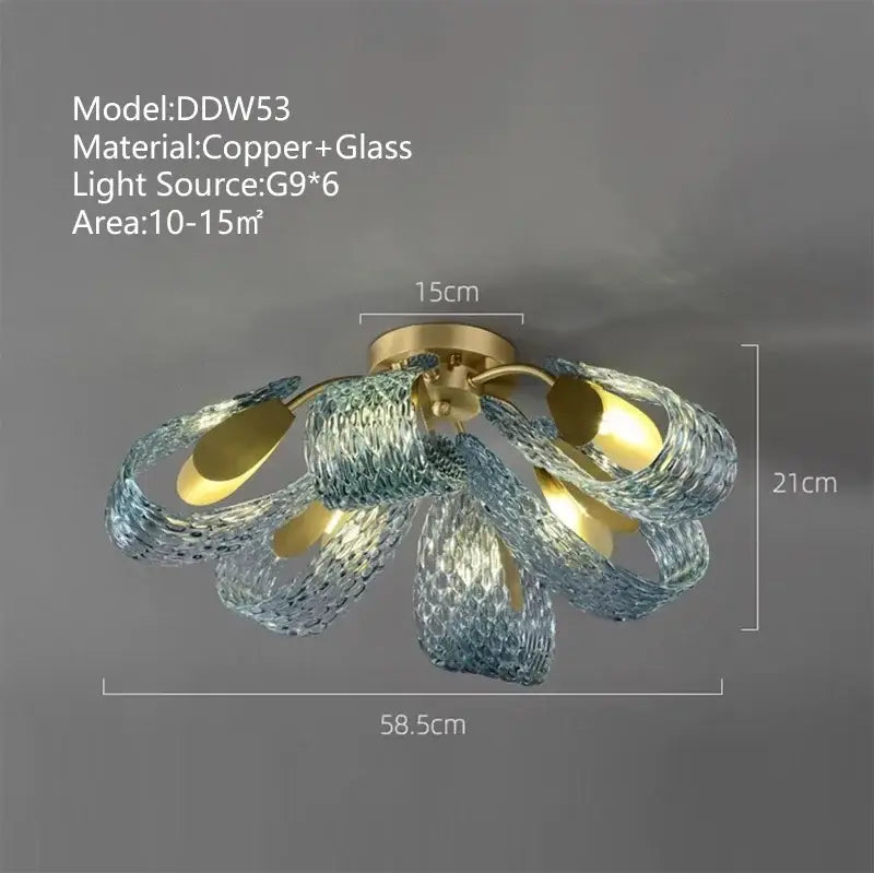 A modern blue peacock leaf glass chandelier with translucent blue petals and copper base for dining room decorbites