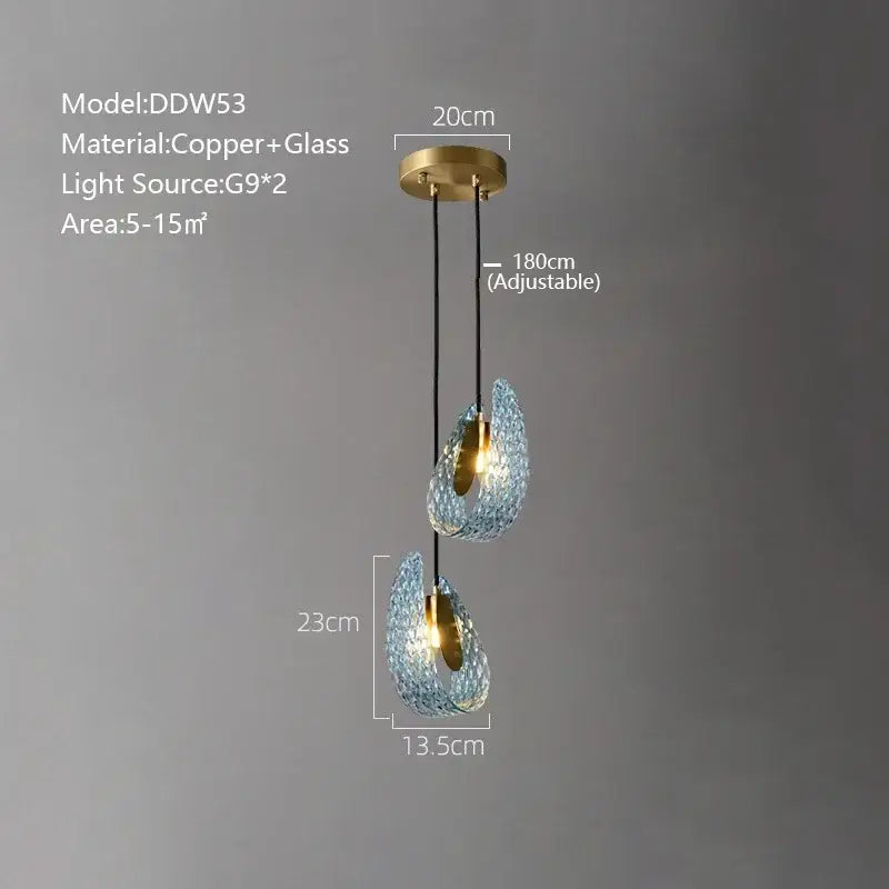 Modern blue peacock leaf glass chandelier with two teardrop textured blue shades suspended from brass mount