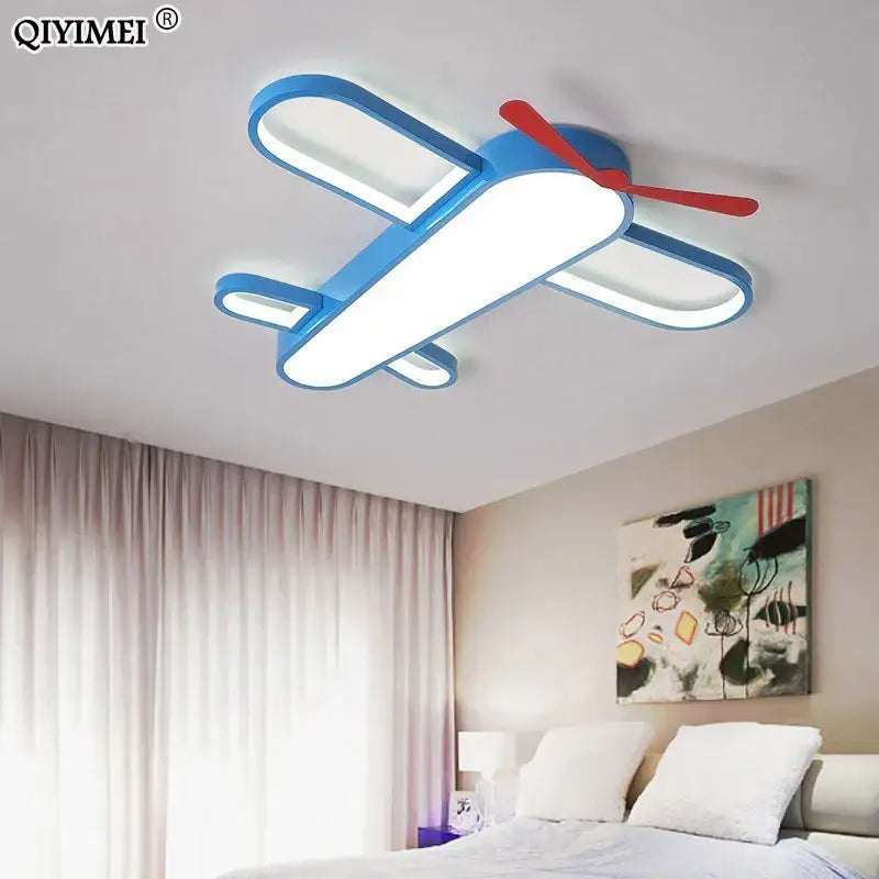 Modern blue and red airplane led lighting fixture by decorbites as a bedroom chandelier with airplane-shaped design