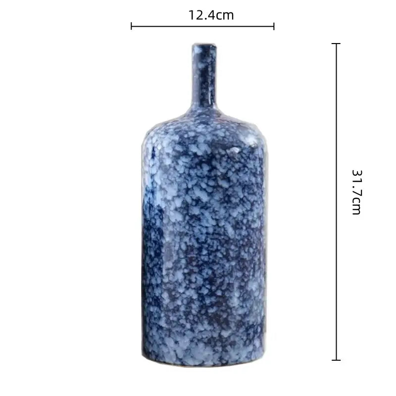 Modern blue speckled ceramic vase with narrow neck in porcelain for living room decorbites blue ceramic accessories