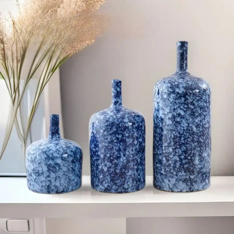 Set of three modern blue ceramic vases with speckled porcelain finish for decorbites living room decor accessories